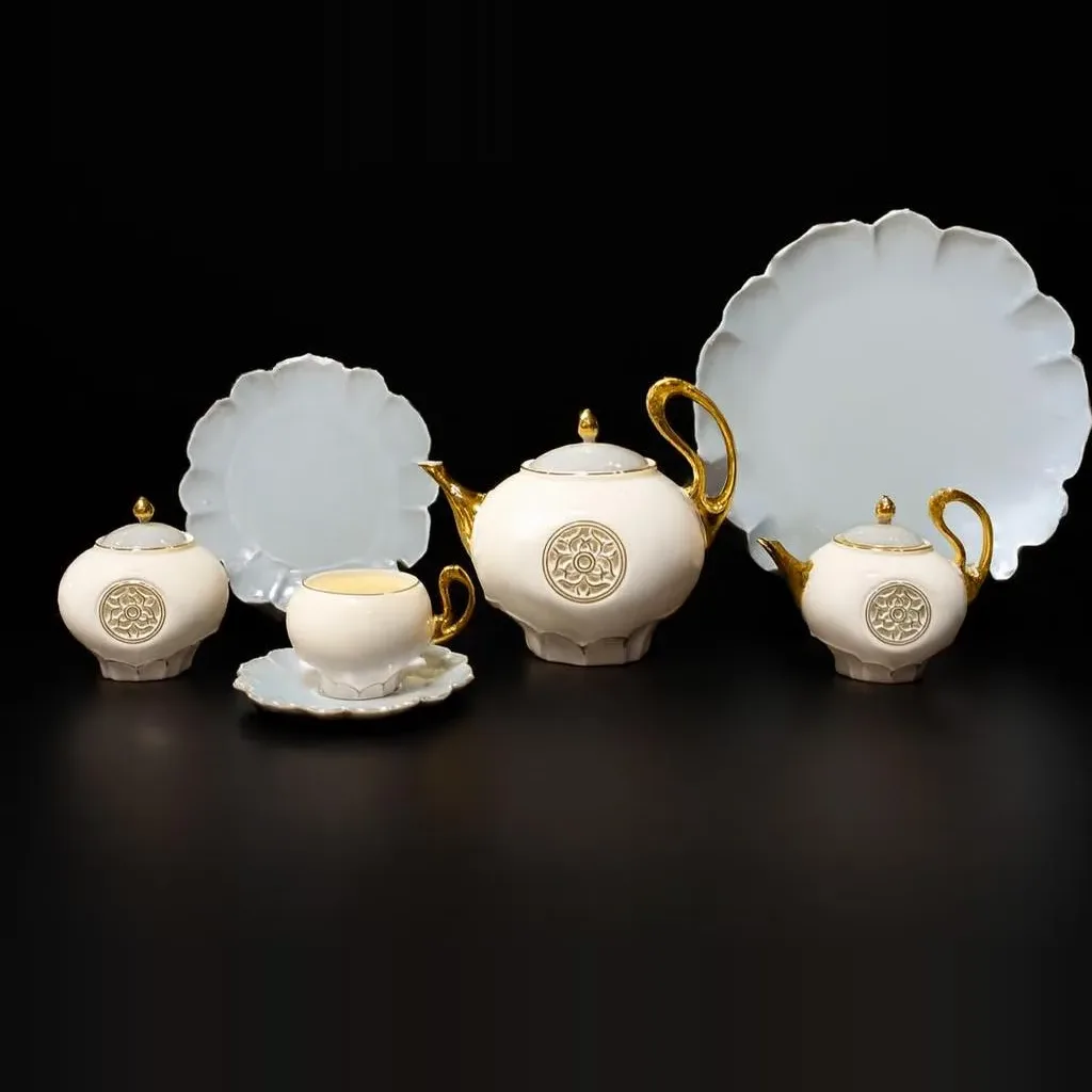 Porcelain tea set with gold trim